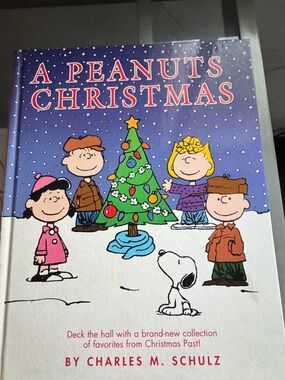 A Peanuts Christmas Hardcover Book by Charles M. Schulz - Blue